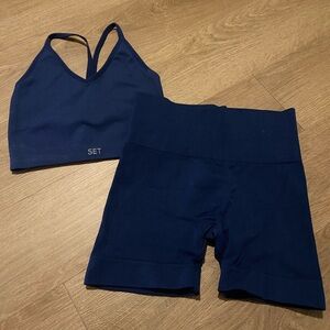 Set Active Sculptflex Ribbed V Bra and Bike Shorts - Navy in Size Small